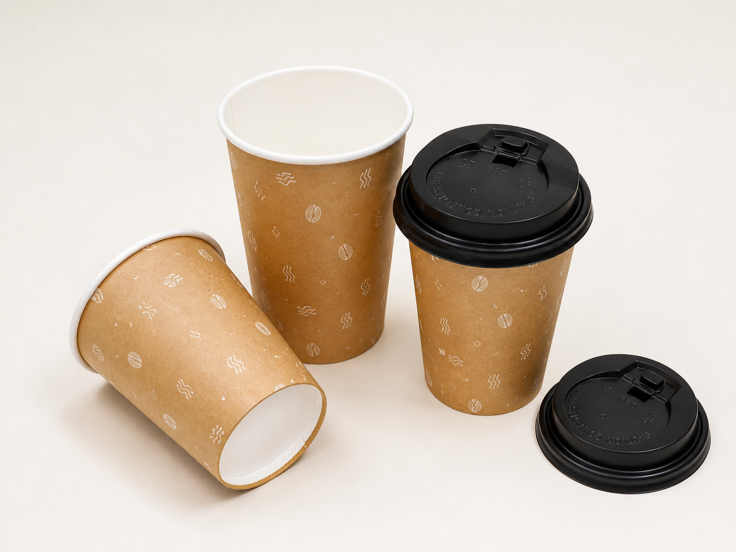 Kraft paper hot-drink cups with black takeaway lids