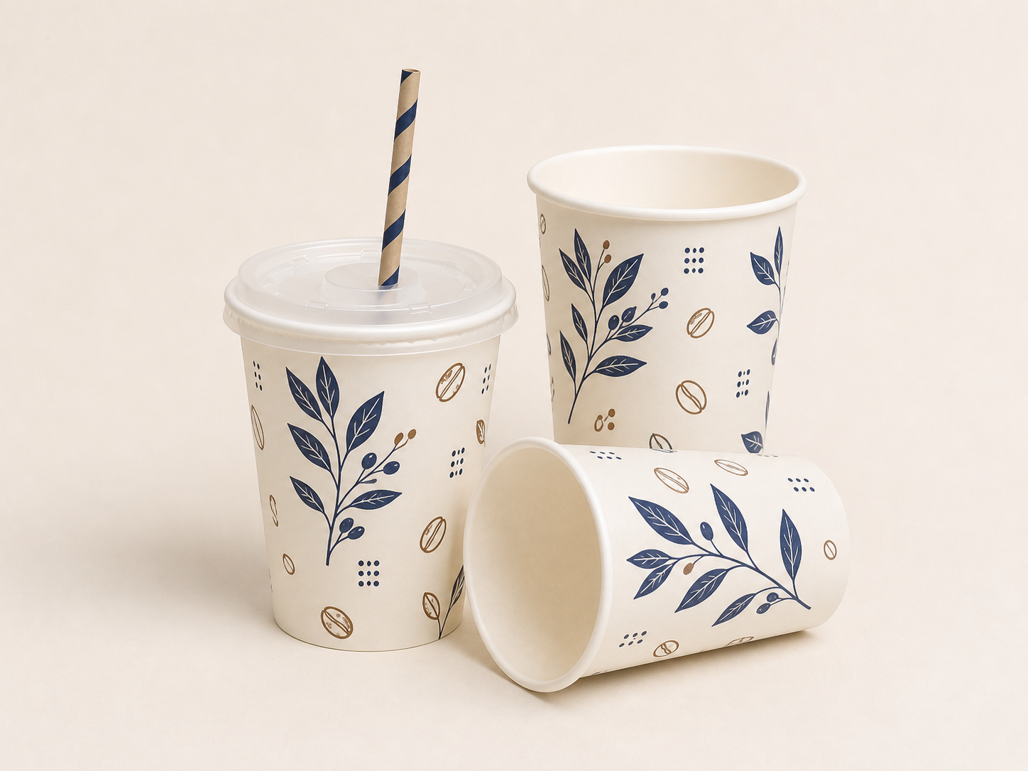 Printed paper cups showing an open cup, fitted lid and paper straw